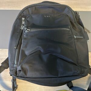 Tumi black backpack